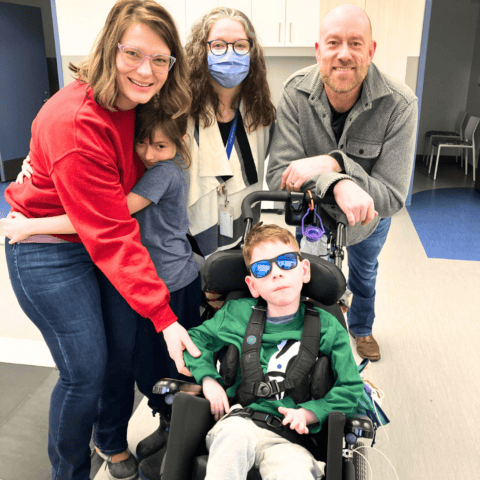 Henry and family, along with Glenrose occupational therapist