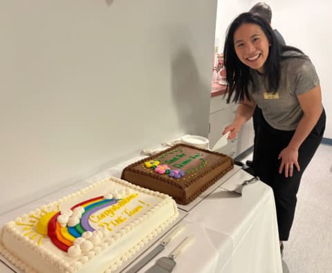 Dr. Sabrina Eliason, developmental pediatric physician at the Glenrose, cuts a cake to celebrate the launch of the PINC program.