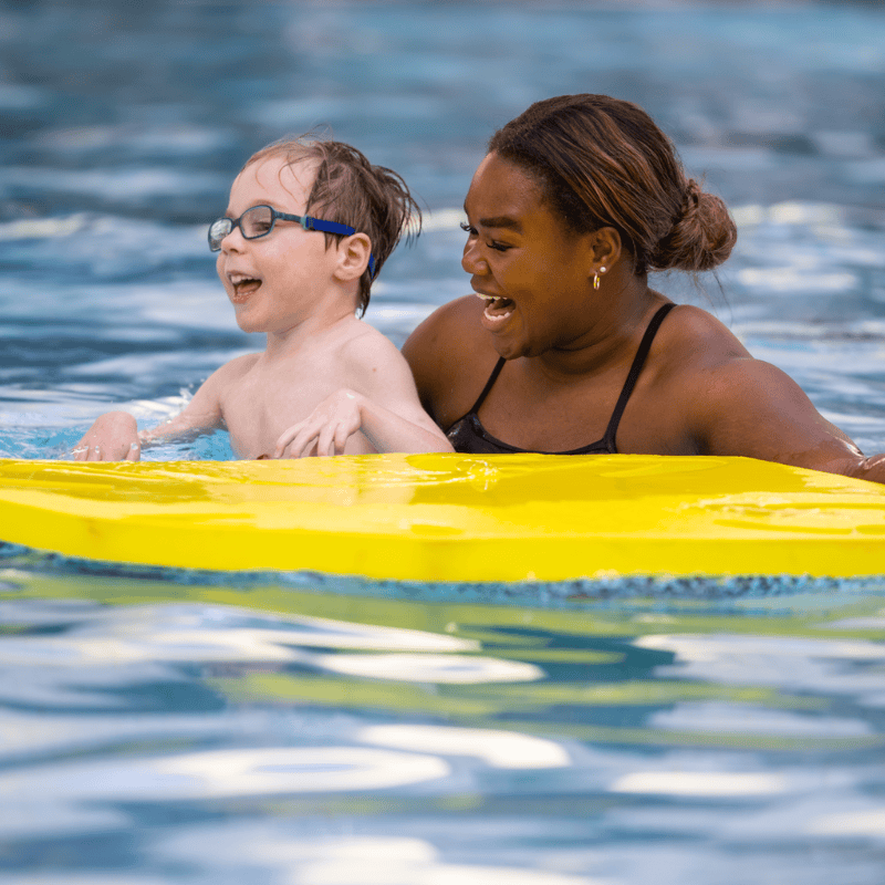 Glenrose recreation therapist doing aquatic therapy with pediatric patient