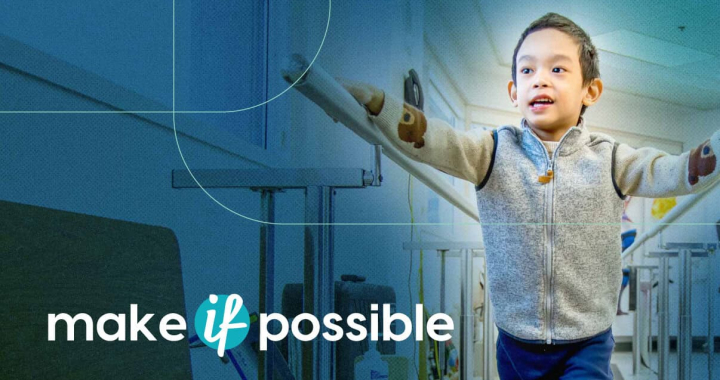 Bright young girl in hospital corridor with arms outstretched, promoting hope and healing at Glenros.
