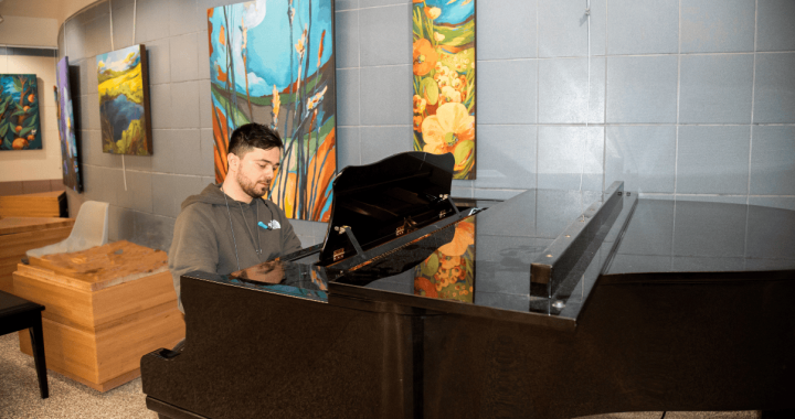 Pianist Riccardo Baldini plays the piano at the Glenrose Rehabilitation Hospital